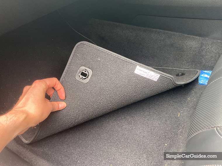 Hidden moisture beneath car floor mats